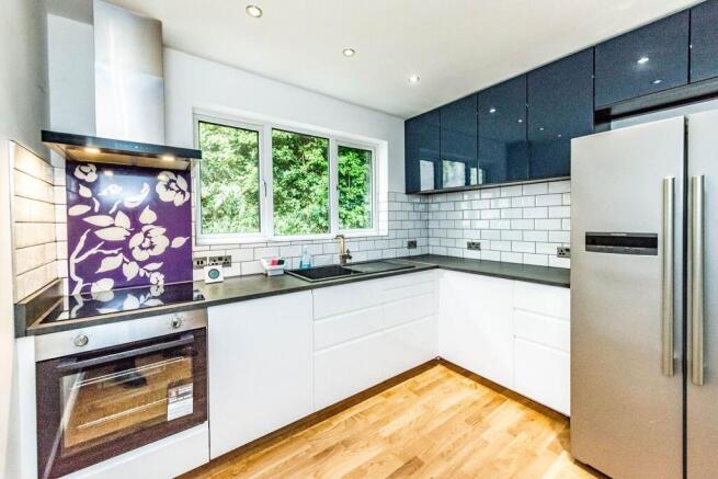 SITTING ROOM AND KITCHEN