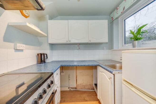 SITTING ROOM AND KITCHEN