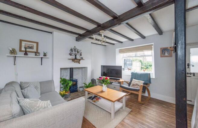 STUNNING SITTING ROOM WITH LOG BURNER