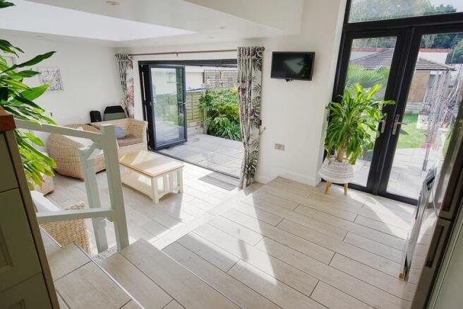 Kitchen down to Living Room Area