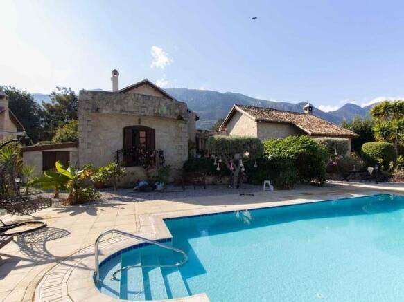4 bedroom resale property + swimming pool + central heating + crafted with Karpaz Stones + Title deed in the owner?s name VAT paid Image 9999 1