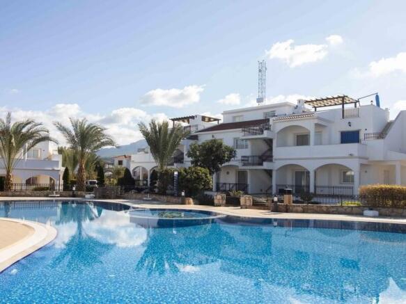 3-bedroom ground floor apartment + communal pools + indoor pool + furnished + air cons + white goods + private beach + gym + spa + restaurant Image 9999 1