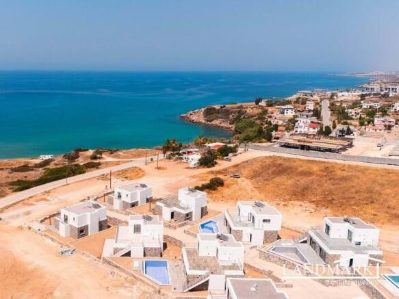 Brand new 3 bedroom contemporary designed resale villa + located on top of a beautiful sandy beach + sea views Image 9999 1