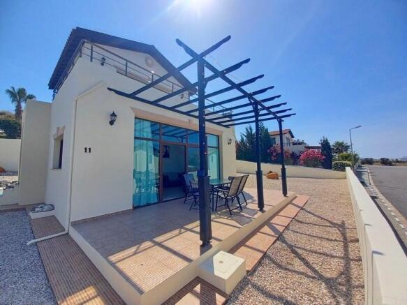 2 bedroom villa with beautiful sea views + furnished + 2 communal swimming pools + walking distance to the beach  + Title deed in the owner?s name VAT paid Image 9999 1