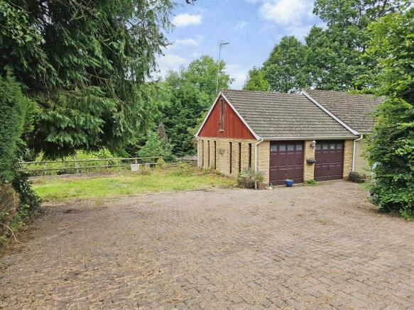 Driveway + Double Garage