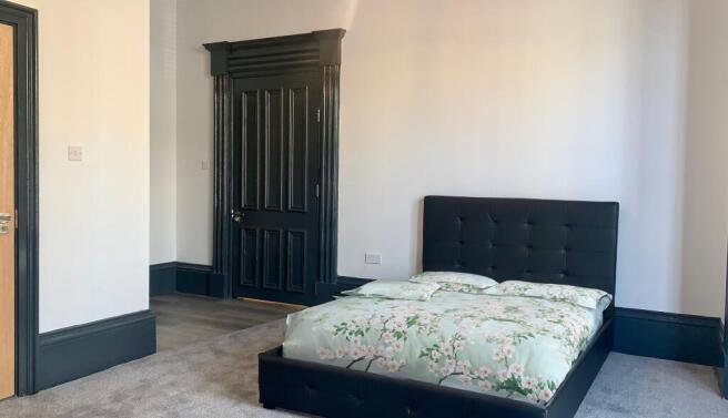 bedroom with green b