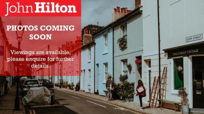 John Hilton - Photos Coming Soon.jpg