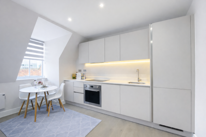 Modern attic kitchen and dining area