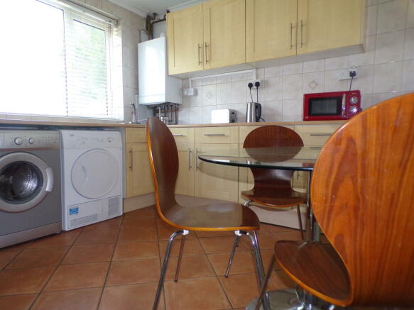 Large Kitchen Diner with Modern White Goods and Ample Storage
