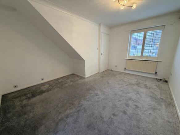 lounge facing window to the front of the house