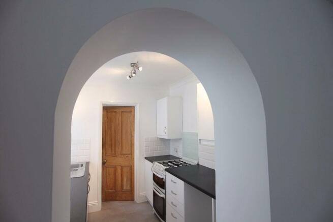 Archway to kitchen