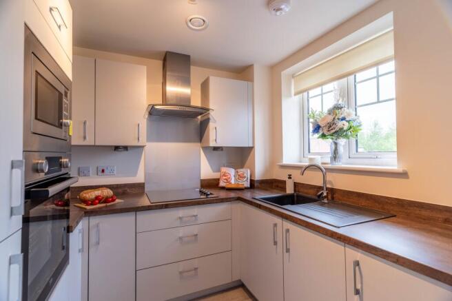 Contemporary kitchen with built in appliances