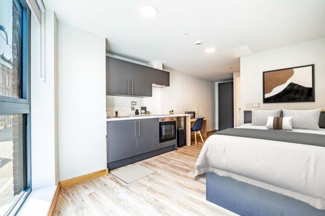 Bedroom, kitchen & living area