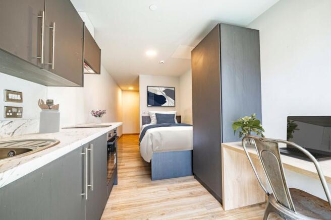 Bedroom, kitchen & living area