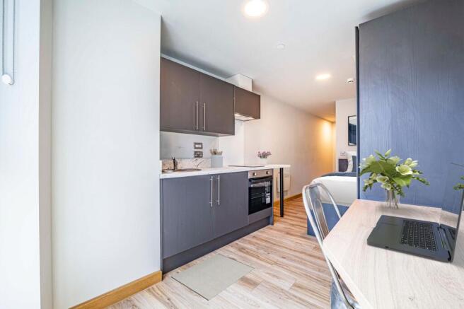 Bedroom, kitchen & living area