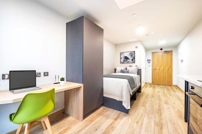 Bedroom, kitchen & living area