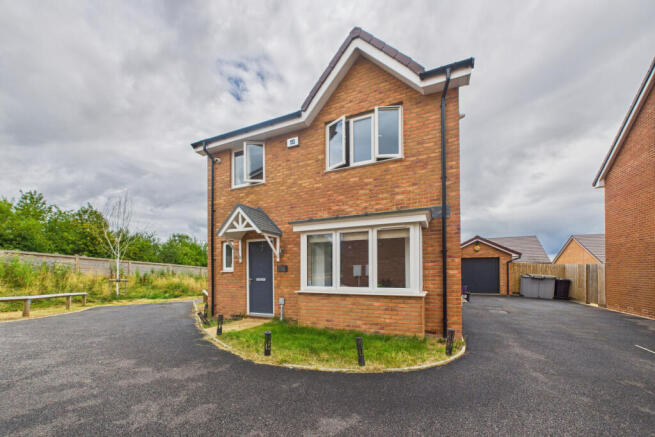 MODERN FOUR-BEDROOM HOME NESTLED IN A POPULAR LYD