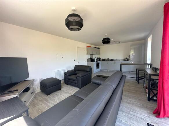 Living Room with Kitchen Area