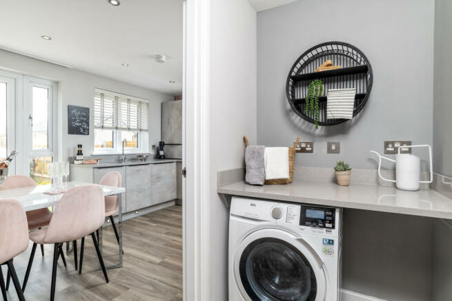 Utility room in three bedroom home