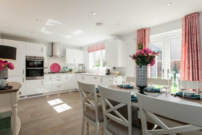 A spacious open plan kitchen/dining area