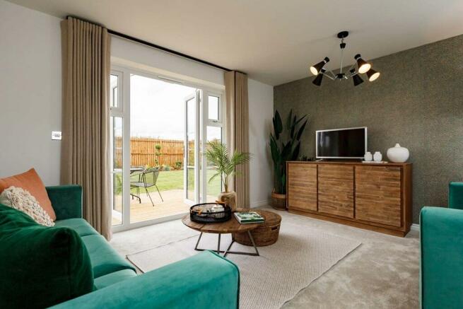 A light and bright living area with French doors to the rear garden