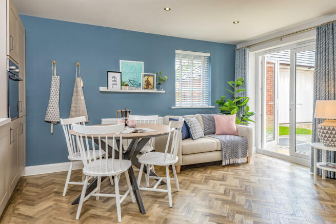 Open plan kitchen with French doors to the garden in the Alderney 4 bedroom home