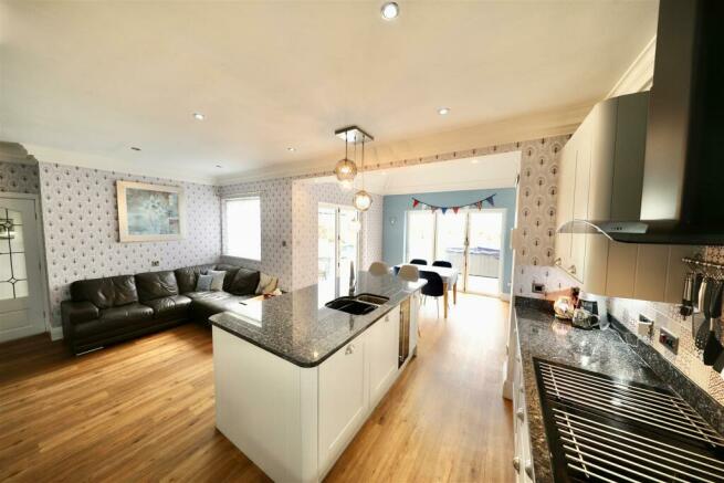 Open plan kitchen, dining and seating area
