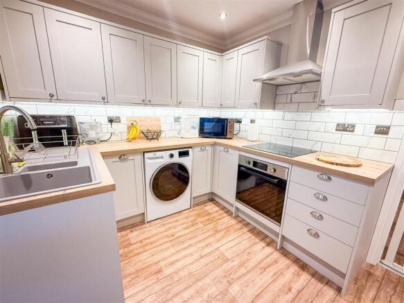 ALTERNATE VIEW OF KITCHEN