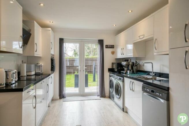 Kitchen installed in 2020 with new french doors looking over garden