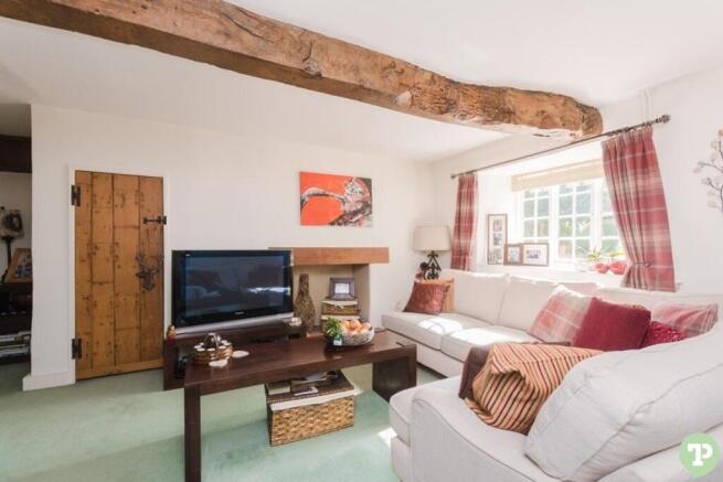 Living room with decorative fireplace