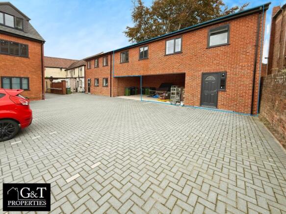 Front Elevation With Outline Of Property & Parking