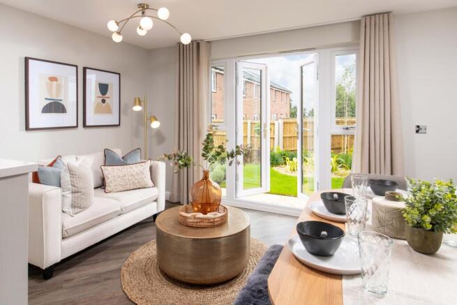 Internal image of the kingsville family room with french doors to garden