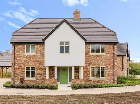Plot 6 Front Blue Sky cropped.jpg