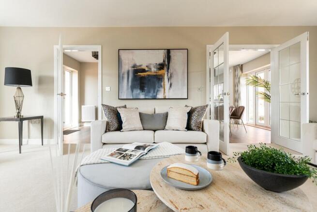 The dual aspect design floods the living room with natural light