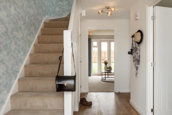 The Chelbury has a spacious hallway with under stair storage