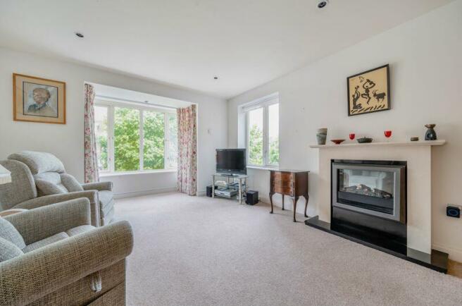 Living/dining room with bay window