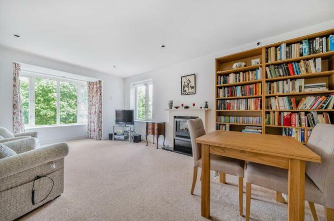 Living/dining room with bay window