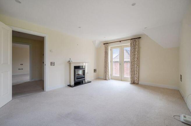 Living/dining room through to balcony