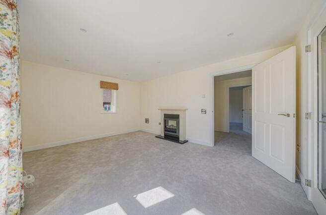 Living/dining room through to hall