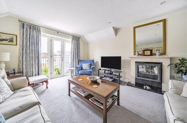 Living/dining room with balcony access