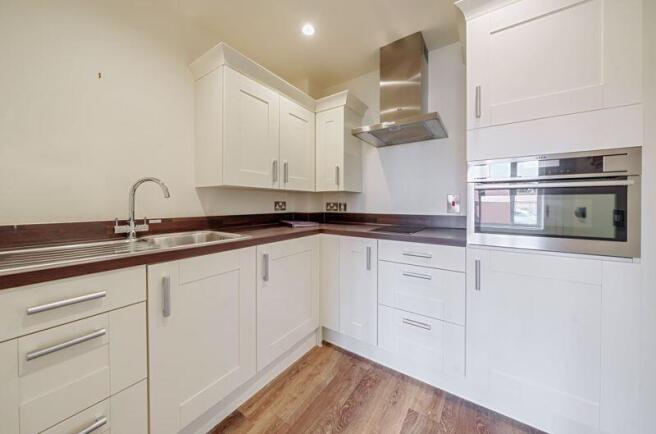 Kitchen with built-in appliances