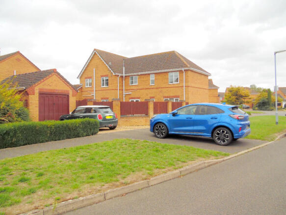 REAR, GARAGE & DRIVE