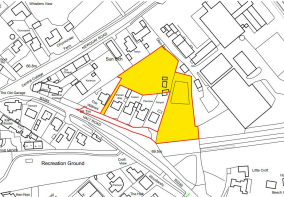 Development Site in Yellow with Access Lane in Whi