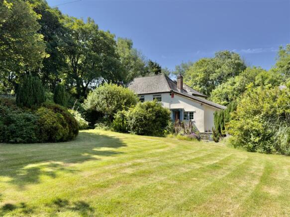 FRONT WITH LAWN II.jpeg