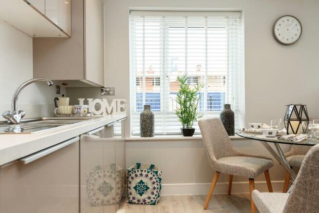 Modern fitted kitchen includes integrated Zanussi appliances