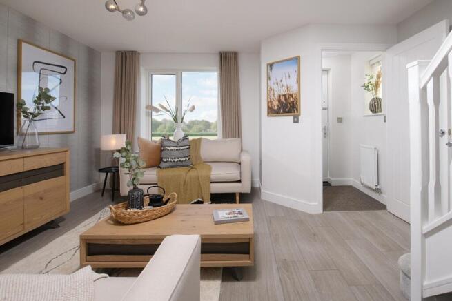 Entering into your comfortable front facing living room