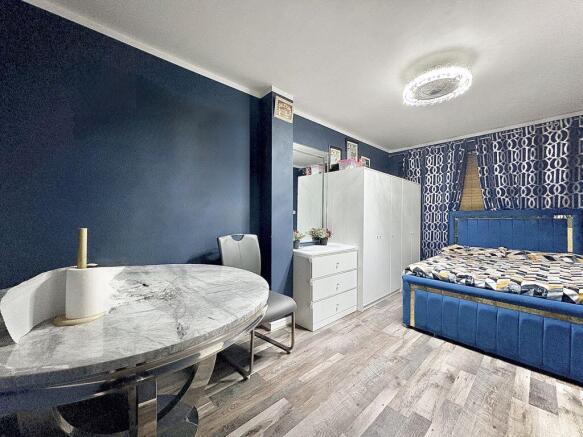 SITTING ROOM/DOWNSTAIRS BEDROOM