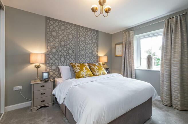 Interior view of a bedroom in our 5 bed Lamberton home