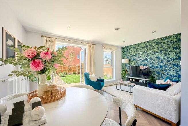 Doors from living area to rear garden, ideal for entertaining