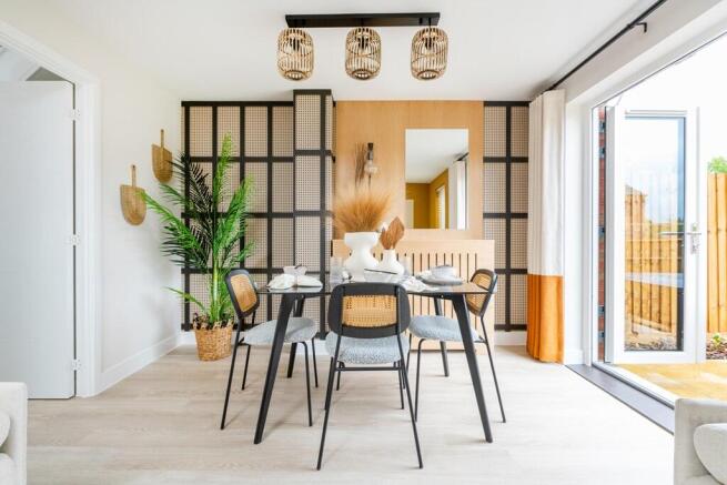 Double doors lead out to the garden from the dining area